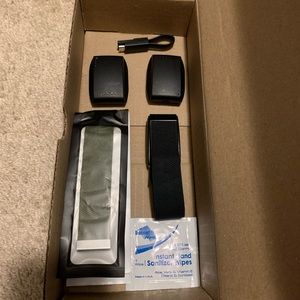 Whoop 3.0, three straps, two portable chargers, charging cable